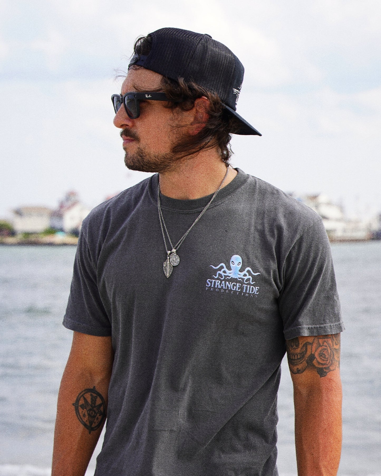 STRANGE TIDE PRODUCTIONS Unisex T-shirt