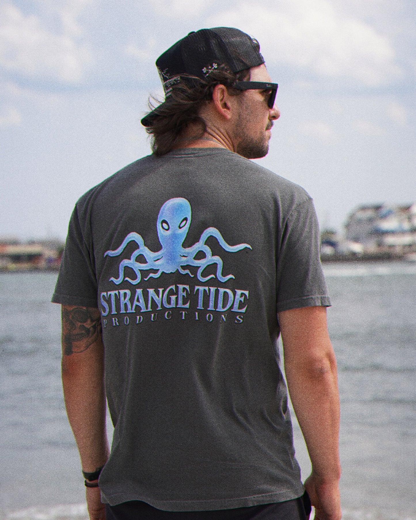 STRANGE TIDE PRODUCTIONS Unisex T-shirt